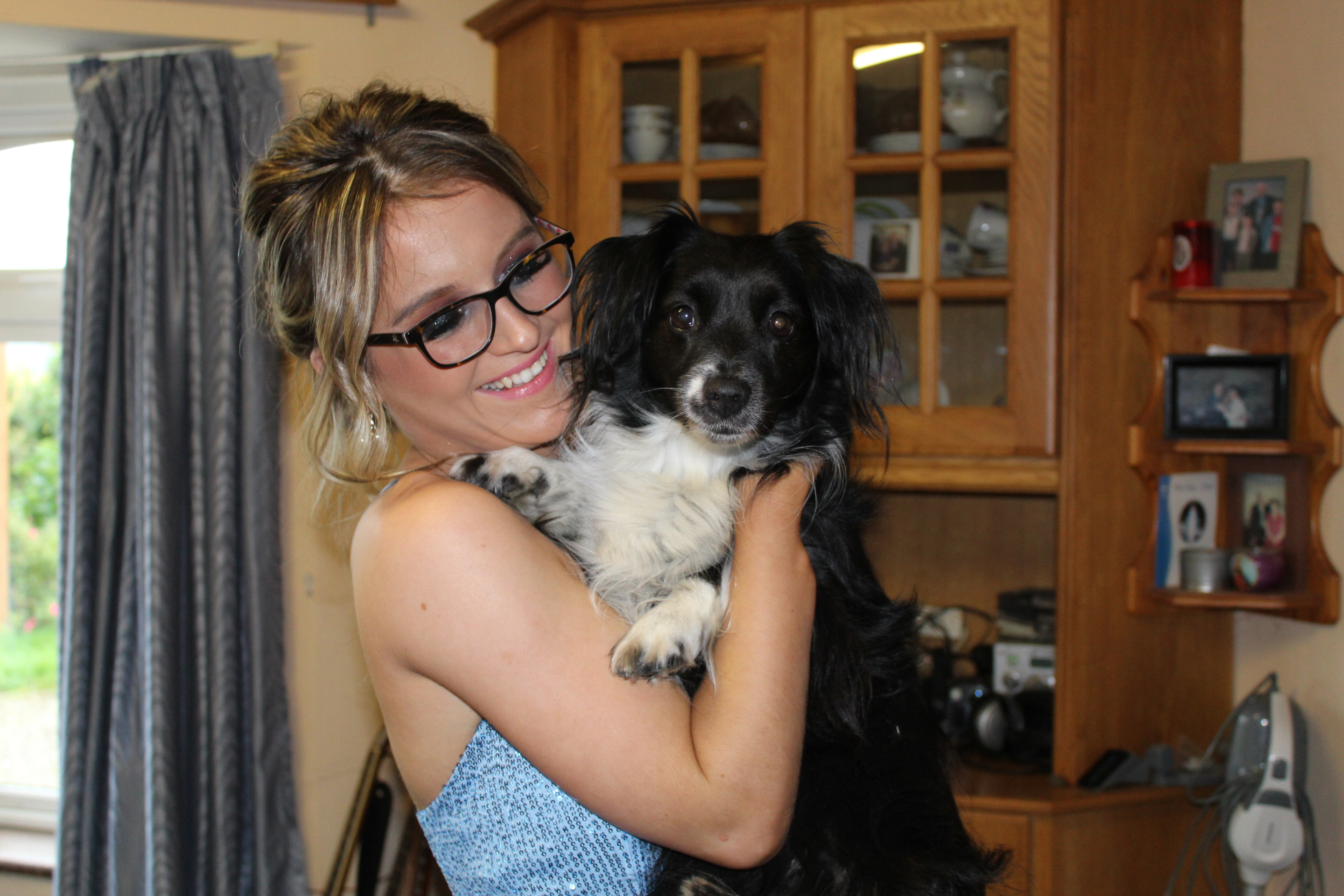 Amy holding Bella, the duo behind Bella Bugs Books