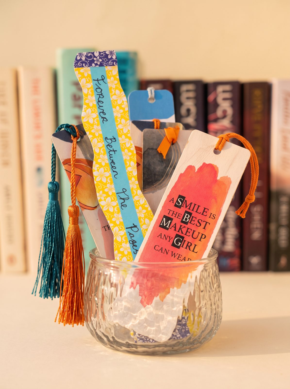 Quote bookmarks standing in a textured glass pot