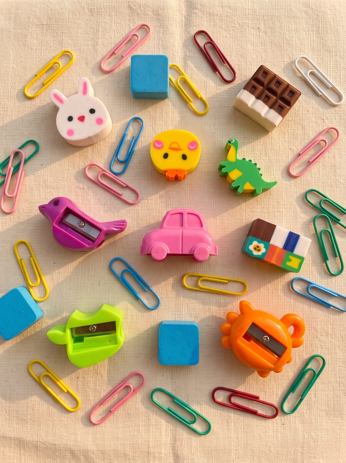 Novelty animal erasers, sharpeners and colourful paperclips